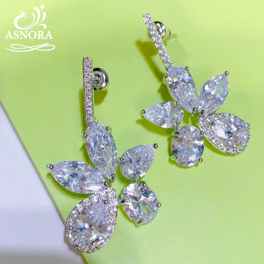 ASNORA Fashion White Color Flower Shape Zircon Water Drop Crystal Drop Earrings for Women Bridal Wedding Long Earrings Jewelry
ASNORA Fashion White Color Flower Shape Zircon Water Drop Crystal Drop Earrings for Women Bridal Wedding Long Earrings Jewelry