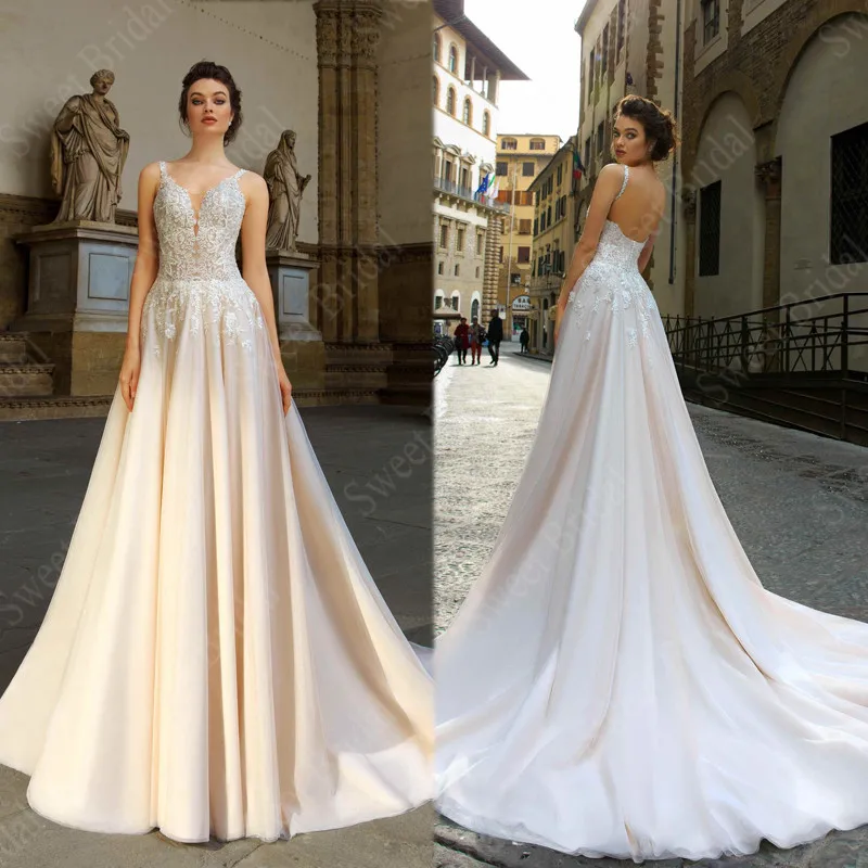 V Neck Wedding Dresses 2021 Lace Appliques Spaghetti Straps Sleeveless Boho Bridal Gowns Vestido De Noiva Sweep Train
V Neck Wedding Dresses 2021 Lace Appliques Spaghetti Straps Sleeveless Boho Bridal Gowns Vestido De Noiva Sweep Train