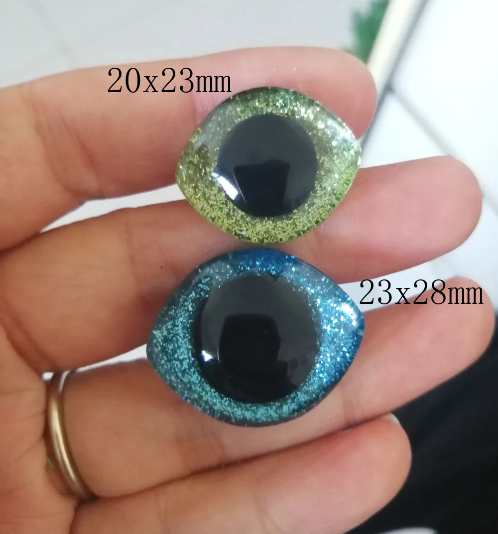 new design 10pcs/lot 28x23mm 20x23mm Oval shape trapezoid plastic clear safety toy eyes + glitter Nonwovens--color option
new design 10pcs/lot 28x23mm 20x23mm Oval shape trapezoid plastic clear safety toy eyes + glitter Nonwovens--color option