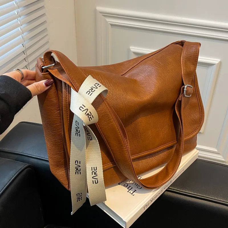 Large Capacity Messenger Bag Female Big Size Leather Shoulder Bag All Match Design Handbags Women's Simple Fashion Crossbody Bag
Large Capacity Messenger Bag Female Big Size Leather Shoulder Bag All Match Design Handbags Women's Simple Fashion Crossbody Bag
