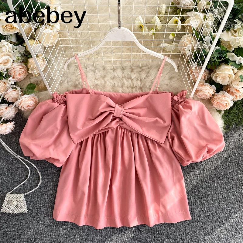 Design Off Shoulder Strap Blouse Women Sexy Backless Puff Sleeve Bow Party Tops Summer Korean Streetwear Short Blouse
Design Off Shoulder Strap Blouse Women Sexy Backless Puff Sleeve Bow Party Tops Summer Korean Streetwear Short Blouse