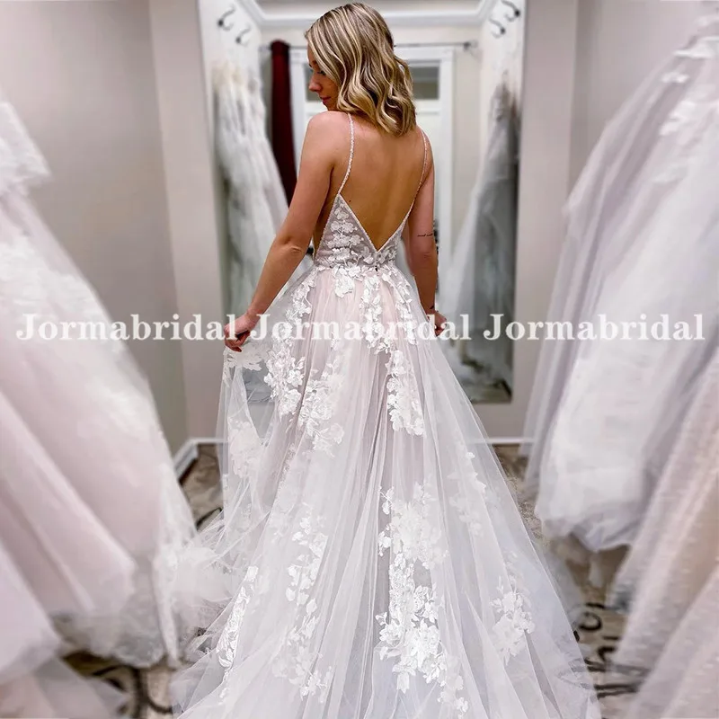 Unique Lace Boho Wedding Dresses With Beaded Spaghetti Strap Sexy V Neck Backless See Through Beach Bridal Gown Vestido de novia
Unique Lace Boho Wedding Dresses With Beaded Spaghetti Strap Sexy V Neck Backless See Through Beach Bridal Gown Vestido de novia