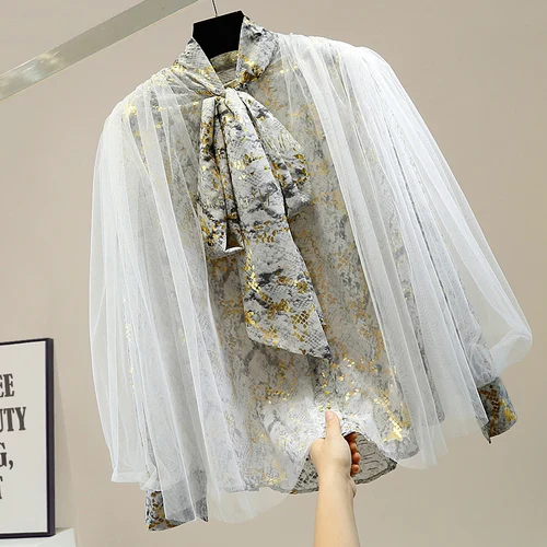Lace-up Bow Mesh Patchwork Puff Sleeve Single-Breasted Gilding Shirt Fashion Lady Loose-Fitting Top Female Blouse Blusas
Lace-up Bow Mesh Patchwork Puff Sleeve Single-Breasted Gilding Shirt Fashion Lady Loose-Fitting Top Female Blouse Blusas