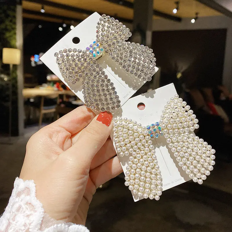 The New Korean Hair Accessories Inlaid Pearl Hairpin Cute Simple Wild Liu Haibin Clip Starry Bow Rhinestone Duckbill Clip
The New Korean Hair Accessories Inlaid Pearl Hairpin Cute Simple Wild Liu Haibin Clip Starry Bow Rhinestone Duckbill Clip
