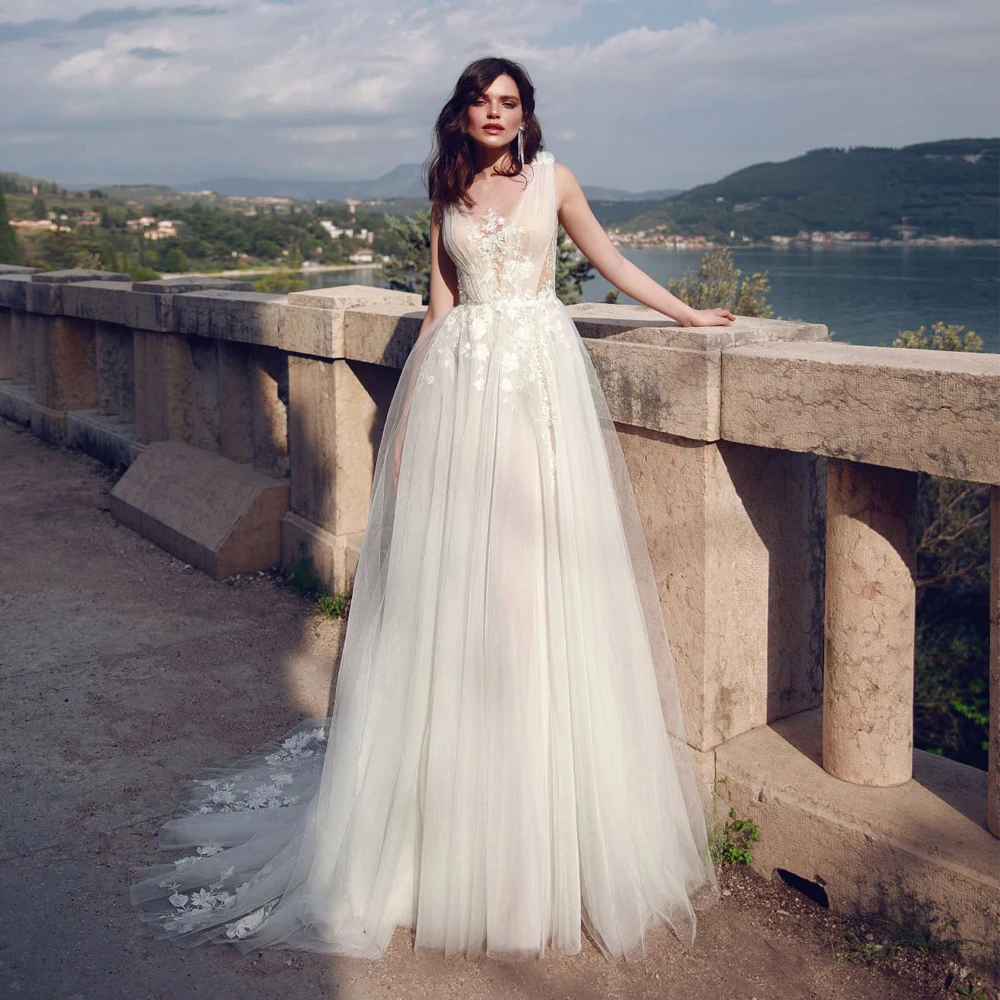 Vestidos Charming Wedding Dresses Tulle Illusion Appliques V-Neck Sleeveless Zipper Ball Sweep Train Bridal Gowns 
Vestidos Charming Wedding Dresses Tulle Illusion Appliques V-Neck Sleeveless Zipper Ball Sweep Train Bridal Gowns