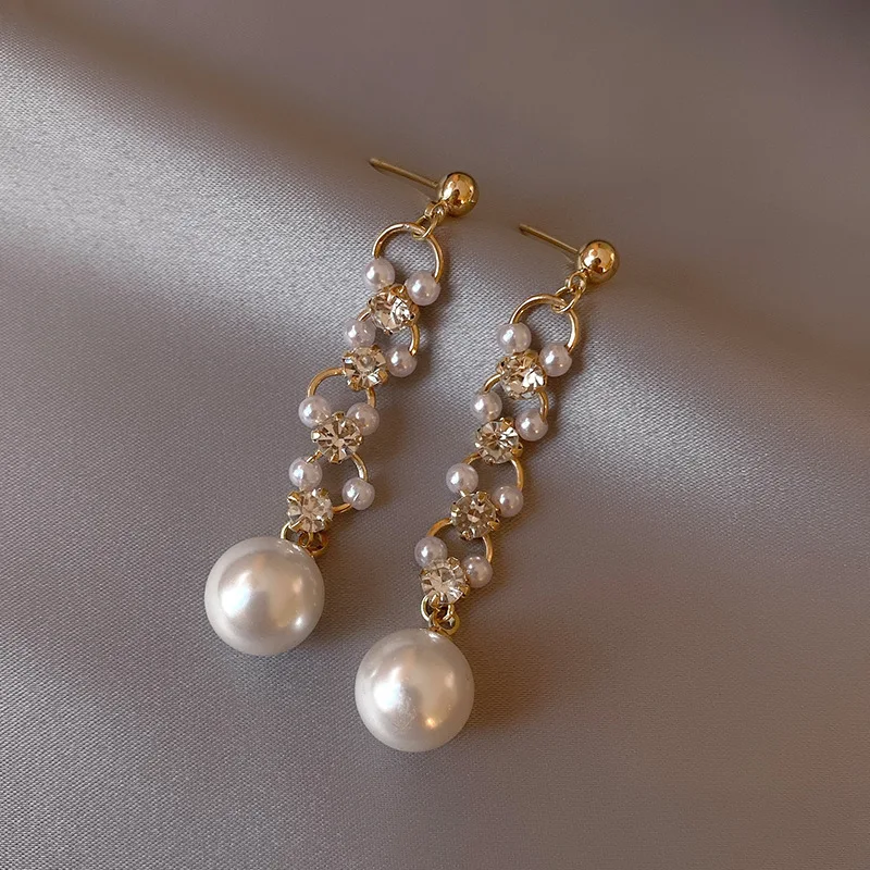 Minar High Street Fashion Spark Rhinestone Long Tassel Earring for Women Imitation Pearls Ball Dangle Drop Earrings Oorbellen
Minar High Street Fashion Spark Rhinestone Long Tassel Earring for Women Imitation Pearls Ball Dangle Drop Earrings Oorbellen