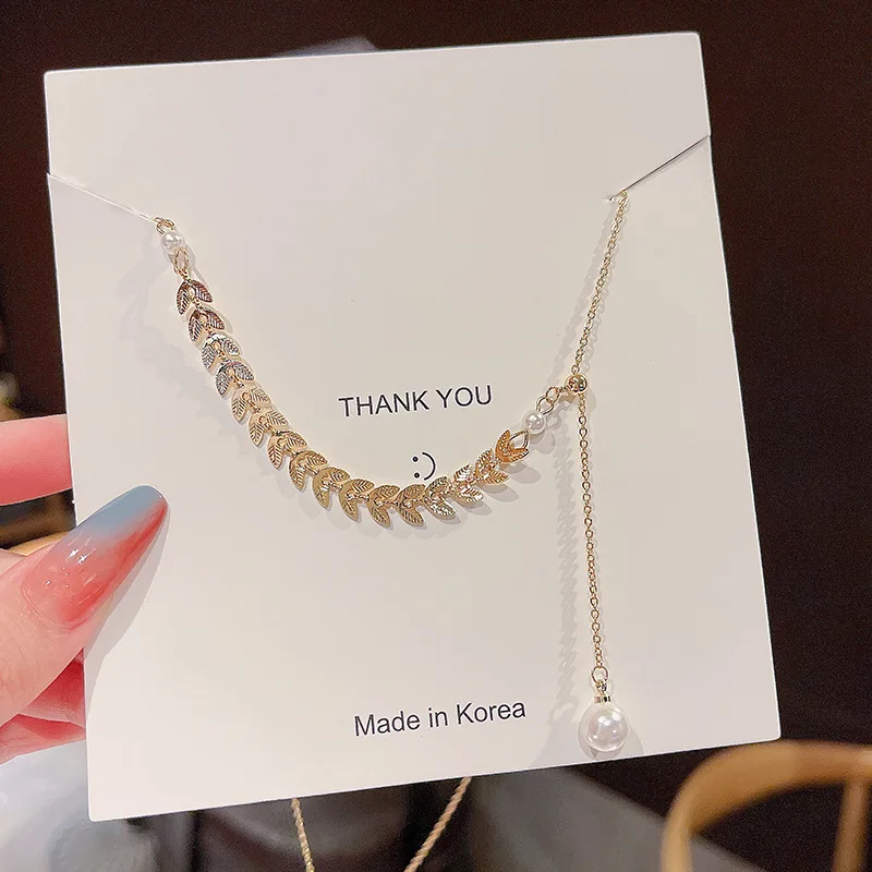 Christmas Birthday Gift Wheat Pearl Necklace Women's Fashion Design Clavicle Chain Hip Hop Cold Style Simple Graceful Necklace
Christmas Birthday Gift Wheat Pearl Necklace Women's Fashion Design Clavicle Chain Hip Hop Cold Style Simple Graceful Necklace