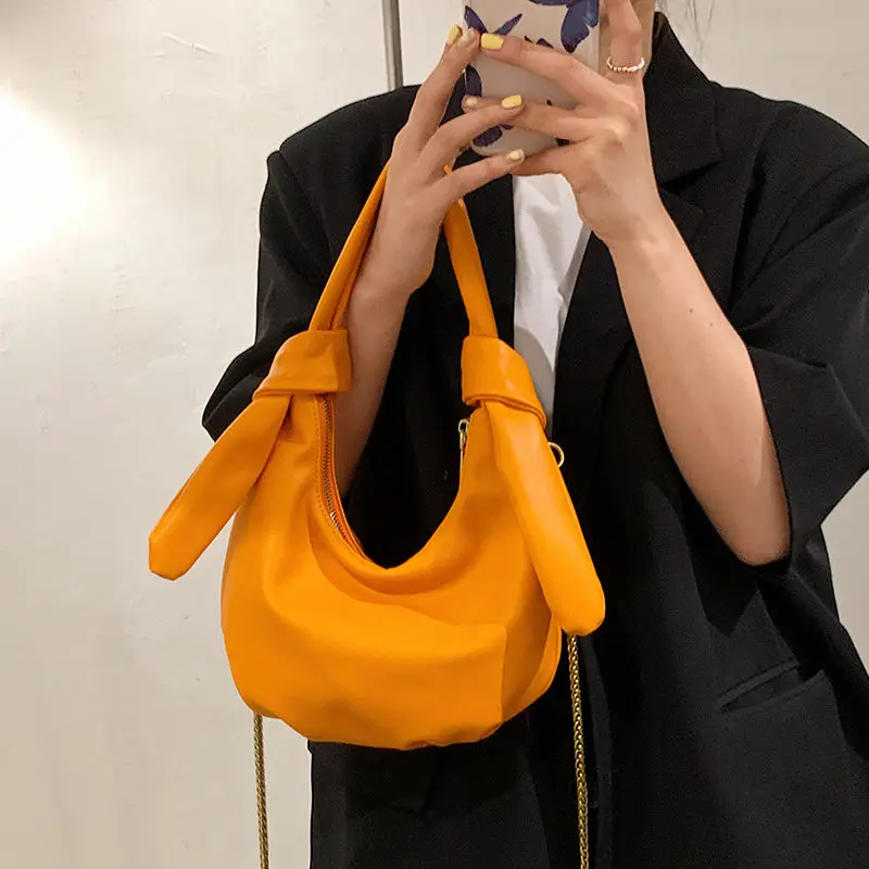 2021 Summer New Women's Niche Fashion Handbags Ladies Versatile Chain Shoulder Messenger Bag Orange Color Zipper Armpit Package
2021 Summer New Women's Niche Fashion Handbags Ladies Versatile Chain Shoulder Messenger Bag Orange Color Zipper Armpit Package