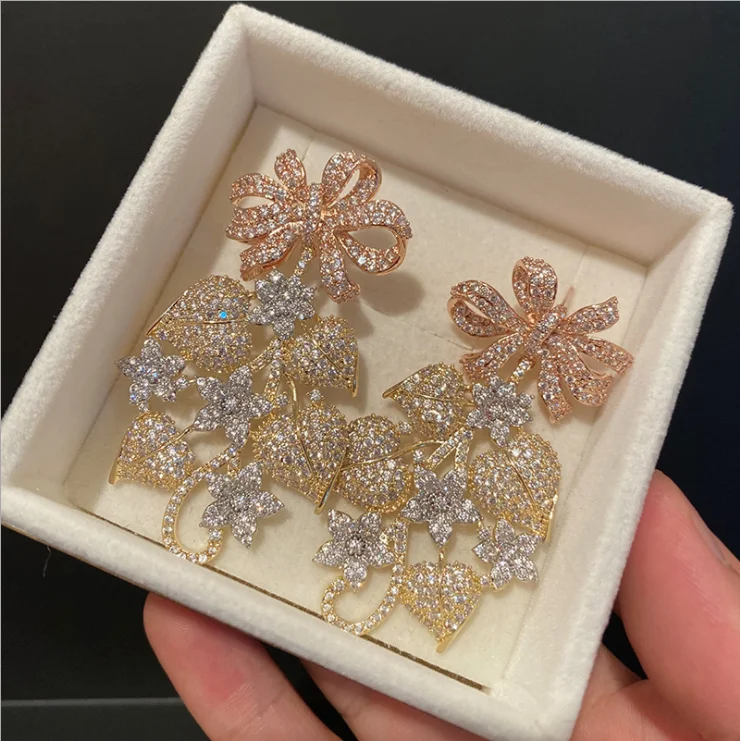 Women full ziecon Exaggerated large version of the three-color gold-plated bow flower earrings exquisite
Women full ziecon Exaggerated large version of the three-color gold-plated bow flower earrings exquisite