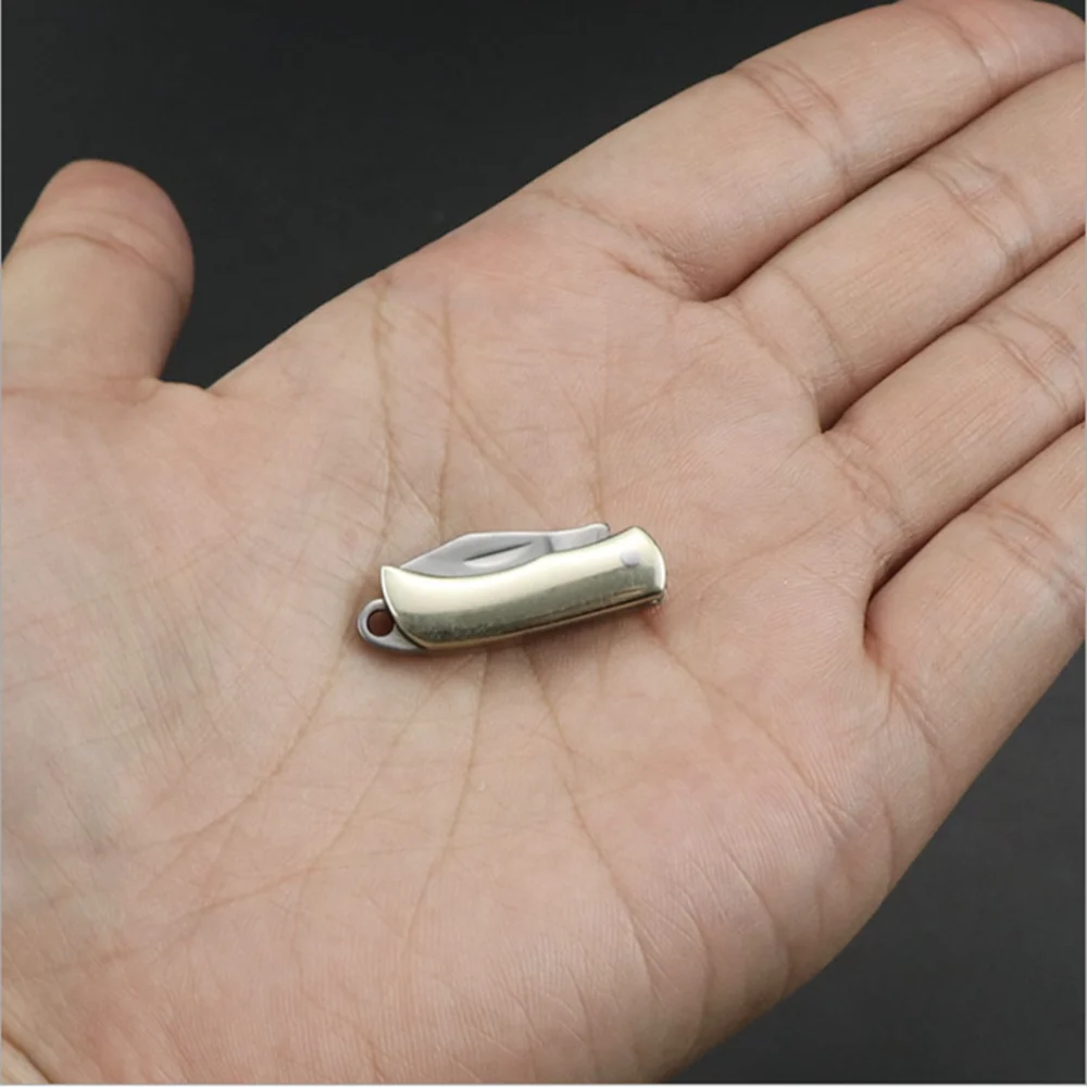 1PCS Multi-Purpose Knife Stainless Folding Brass Mirror Outdoor Sharp Blade Self-Defense Open The Packing
1PCS Multi-Purpose Knife Stainless Folding Brass Mirror Outdoor Sharp Blade Self-Defense Open The Packing