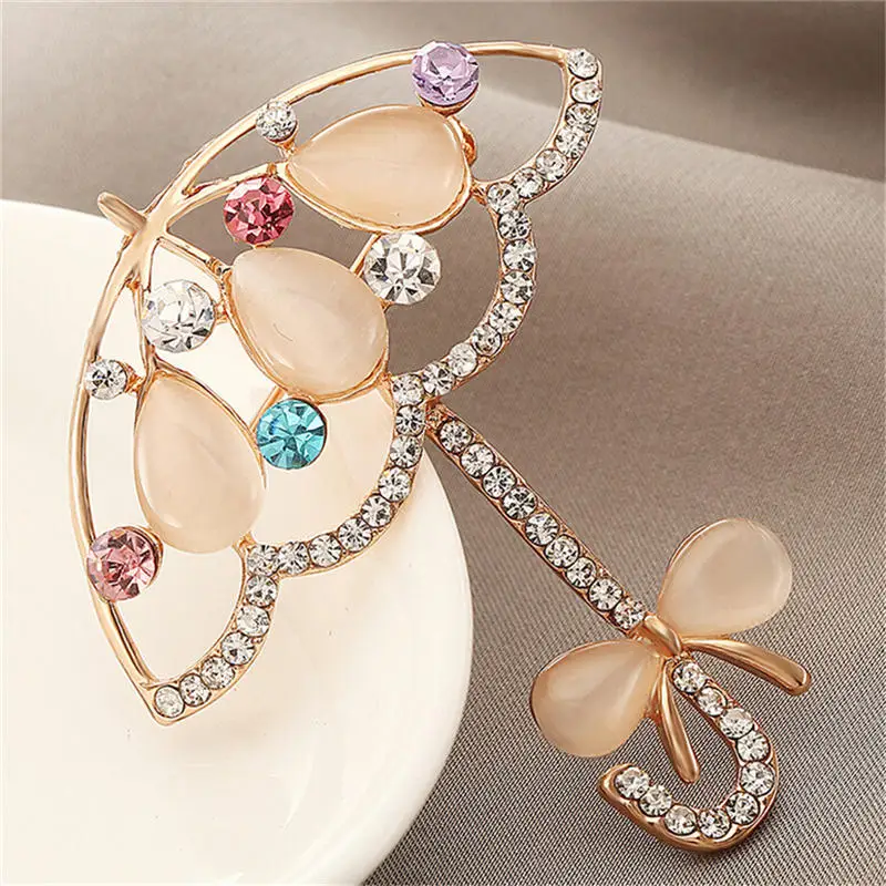 1PC Korean version of the popular cute small umbrella high-end opal brooch colorful fashion brooch shawl buckle pop brooch
1PC Korean version of the popular cute small umbrella high-end opal brooch colorful fashion brooch shawl buckle pop brooch