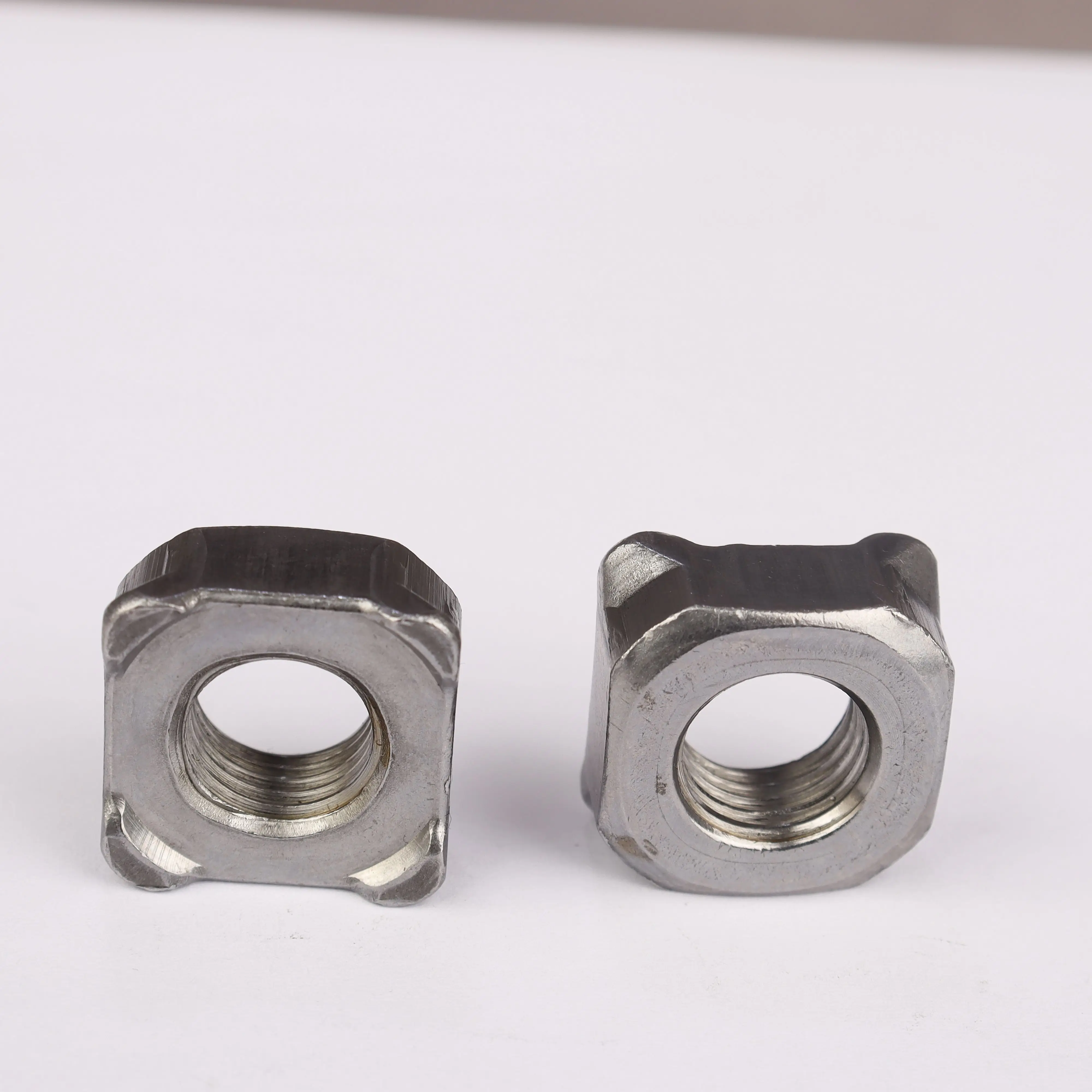 DIN928 M4 M5 M6 M8 M10 Square Weld Nuts Four Corner Welding Nut Square Spot Welding Nuts
DIN928 M4 M5 M6 M8 M10 Square Weld Nuts Four Corner Welding Nut Square Spot Welding Nuts