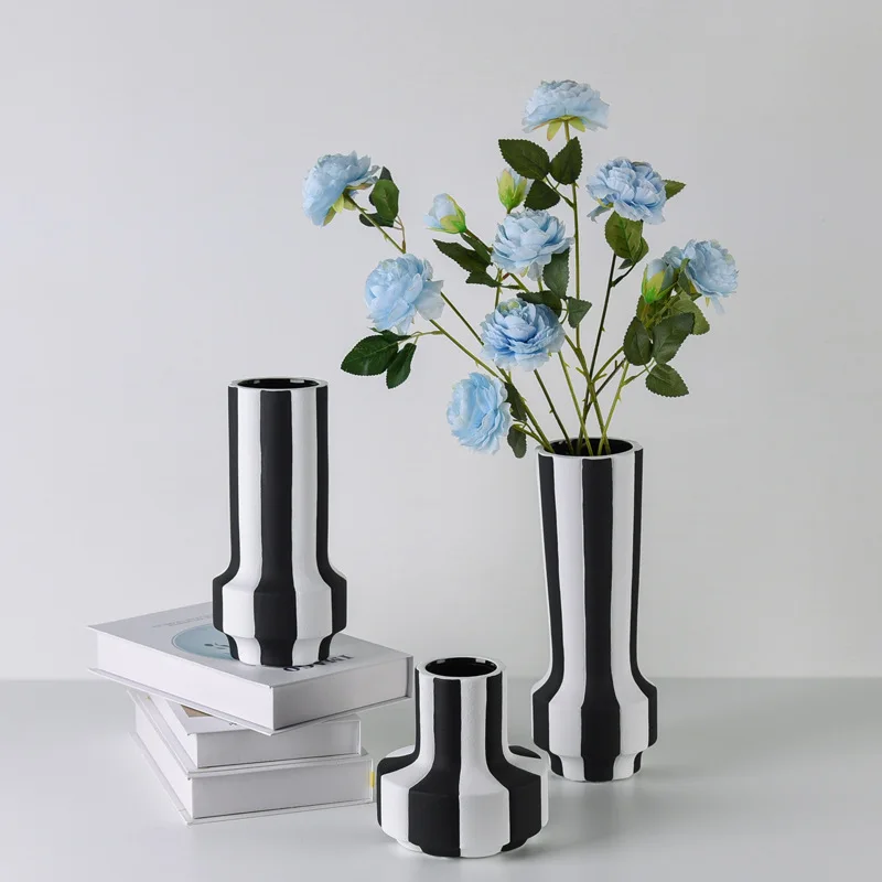 Modern simple black and white striped wide mouth vase flower shop model room dining table home furnishing handicraft decoration
Modern simple black and white striped wide mouth vase flower shop model room dining table home furnishing handicraft decoration