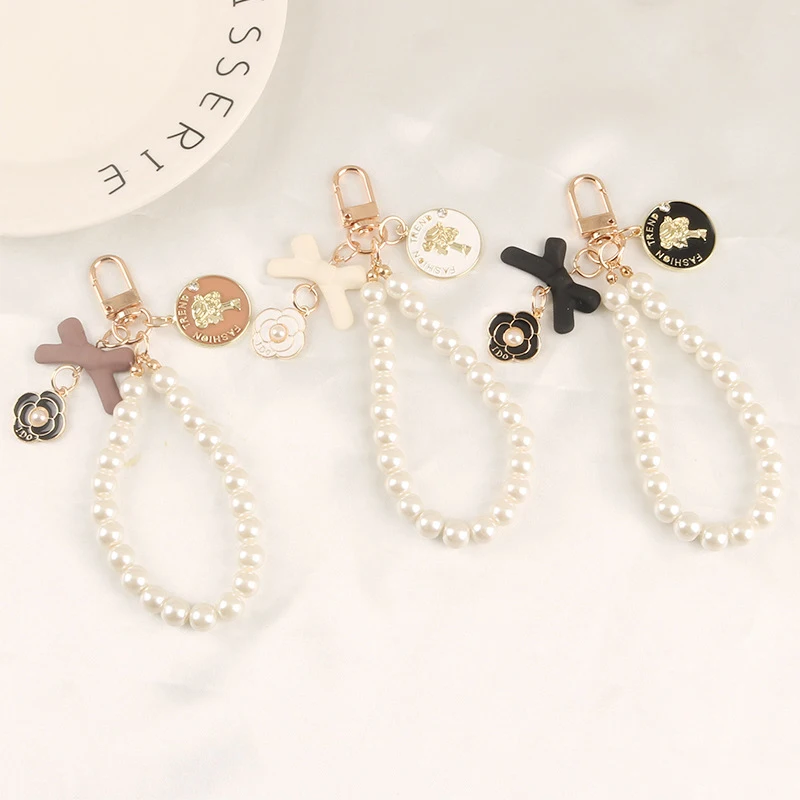 Exquisite Pearl Bow Keychain All-match Fashion Mobile Phone Case Decoration Bag Accessories Beautiful Flower Keychain
Exquisite Pearl Bow Keychain All-match Fashion Mobile Phone Case Decoration Bag Accessories Beautiful Flower Keychain