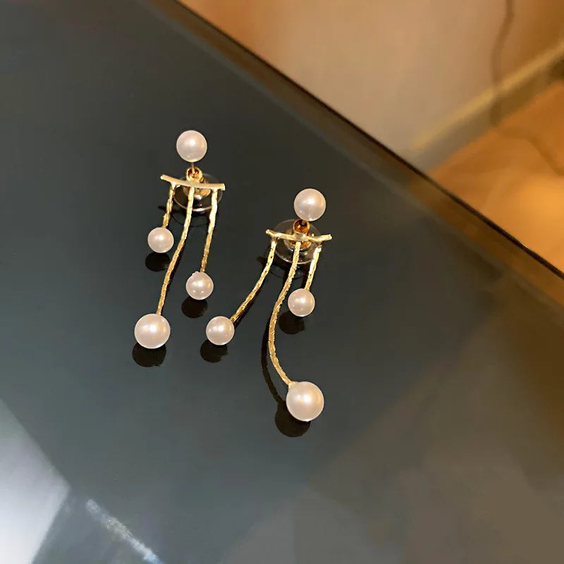 New Fashion Simple Pearl Tassel Women's Birthday Gift Earrings Elegant Romantic Temperament Jewelry Earrings Wholesale
New Fashion Simple Pearl Tassel Women's Birthday Gift Earrings Elegant Romantic Temperament Jewelry Earrings Wholesale