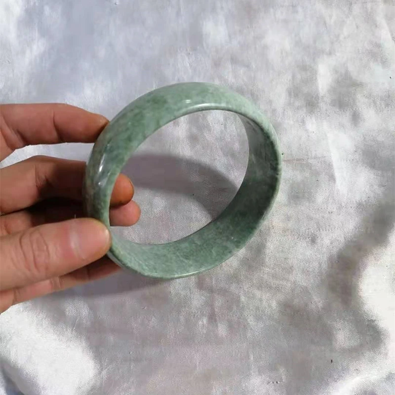 Natural turquoise hand carved 81mmlarge jade bracelet arm bracelet fashion boutique men's and women's large Bracelet
Natural turquoise hand carved 81mmlarge jade bracelet arm bracelet fashion boutique men's and women's large Bracelet