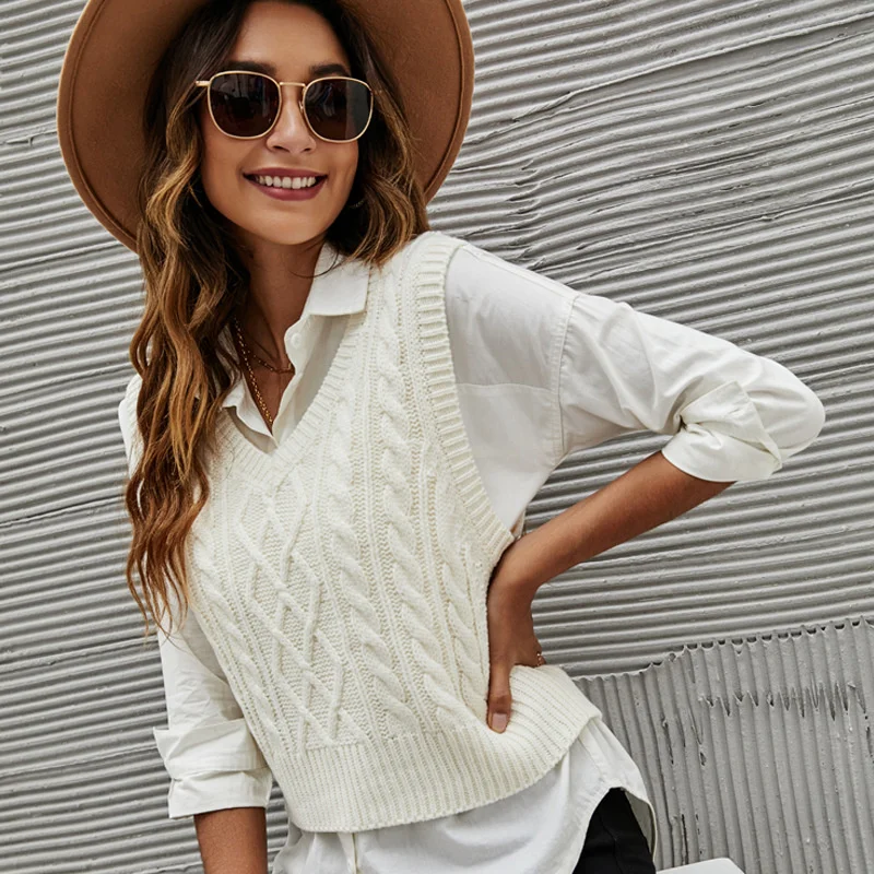 Autumn and winter 2021 new solid color V-neck twisted knit vest loose Pullover sleeveless sweater women 
Autumn and winter 2021 new solid color V-neck twisted knit vest loose Pullover sleeveless sweater women