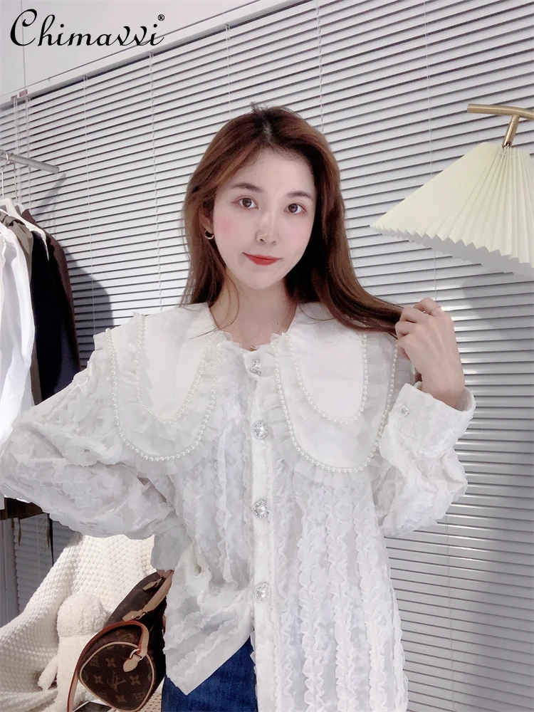 2021 Autumn New Korean Fashion Lapel Long Sleeve Shirt Doll Collar Heavy Industry Beaded Velvet Stitching Lace Blouse All-match
2021 Autumn New Korean Fashion Lapel Long Sleeve Shirt Doll Collar Heavy Industry Beaded Velvet Stitching Lace Blouse All-match