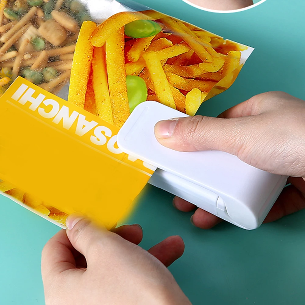 Keep Fresh Mini Sealer Home Heat Bag Plastic Food Snacks Bag Sealing Machine Food Packaging Kitchen Storage Bag Clips
Keep Fresh Mini Sealer Home Heat Bag Plastic Food Snacks Bag Sealing Machine Food Packaging Kitchen Storage Bag Clips