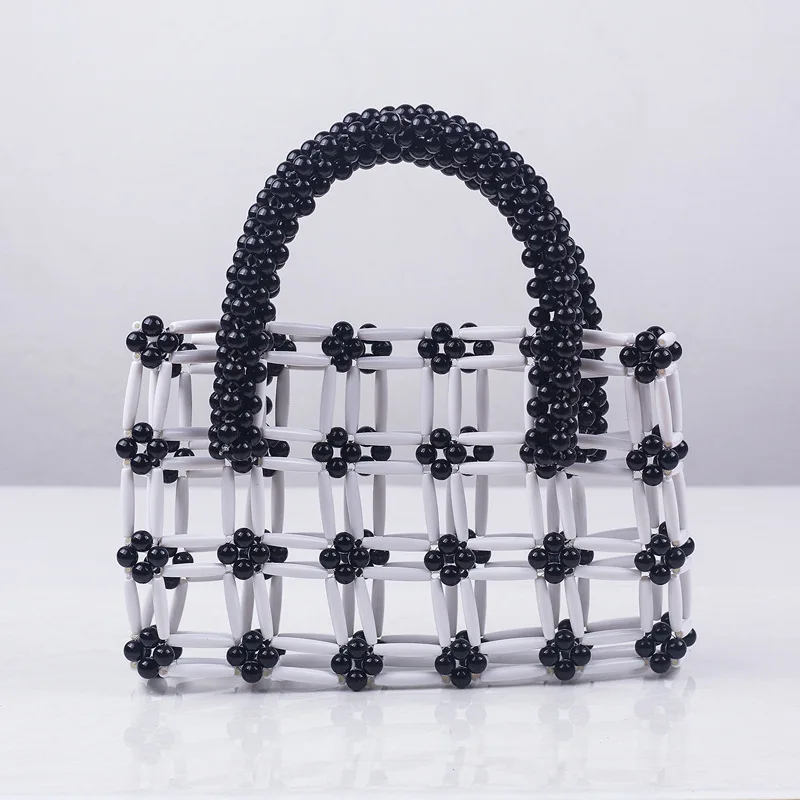 Hollow out black and white stitched acrylic evening handbags hand woven Beaded retro fashion luxury pouch bags for women
Hollow out black and white stitched acrylic evening handbags hand woven Beaded retro fashion luxury pouch bags for women