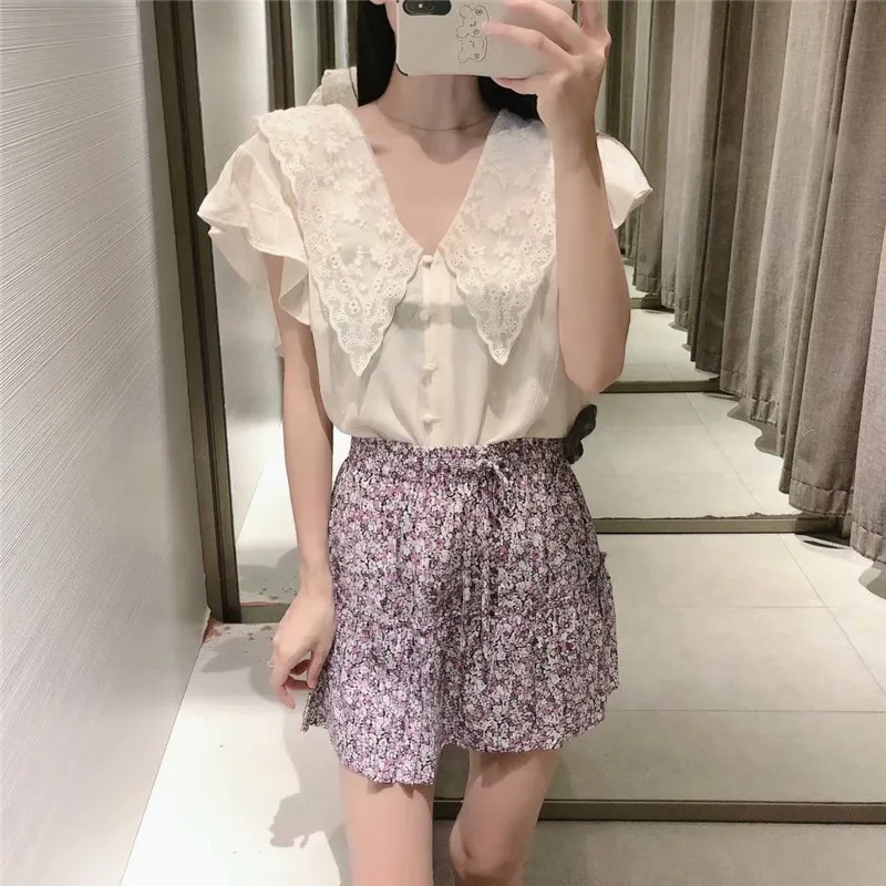 Za 2021 Ruffle Short Sleeve Embroidered Blouse Women Vintage Lapel Summer Shirt Chic Button Up Female Casual Embroiderey Top
Za 2021 Ruffle Short Sleeve Embroidered Blouse Women Vintage Lapel Summer Shirt Chic Button Up Female Casual Embroiderey Top