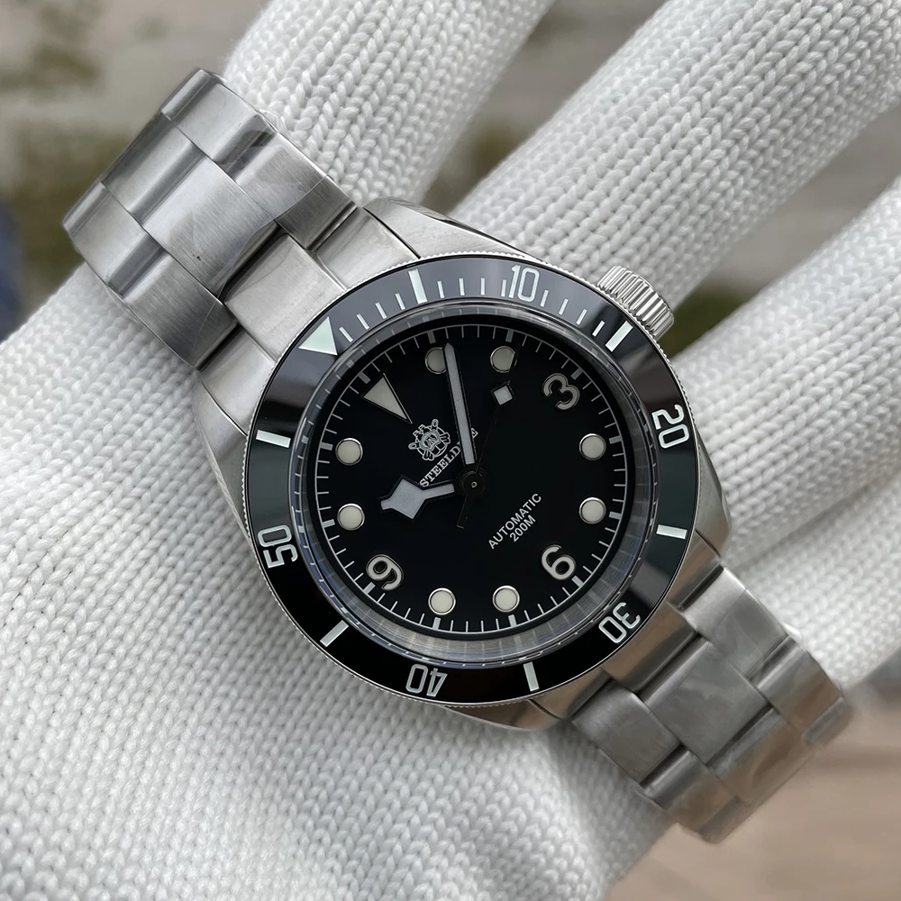 2021 Steeldive NH35 Diver Watches Men Sapphire Ceramic bezel 200M Water Resistant Black Mechanical Wrist Watch
2021 Steeldive NH35 Diver Watches Men Sapphire Ceramic bezel 200M Water Resistant Black Mechanical Wrist Watch