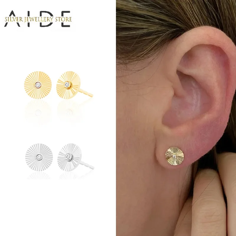 AIDE Minimalism Sun Stud Earrings For Women Punk INS Zircon Round Piercing 925 Sterling Silver Earings Fine Jewelry kolczyki
AIDE Minimalism Sun Stud Earrings For Women Punk INS Zircon Round Piercing 925 Sterling Silver Earings Fine Jewelry kolczyki