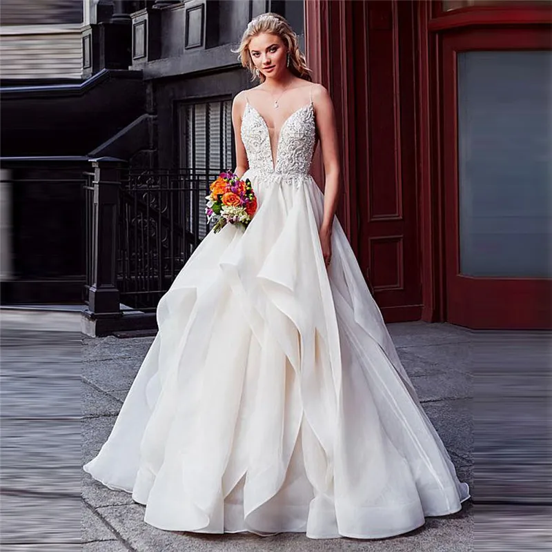 Sexy Spaghetti Strips 2020 Lace Beading Ruffles Wedding Dress Backless Pleated Custom Plus Size Bridal Gowns Fashion
Sexy Spaghetti Strips 2020 Lace Beading Ruffles Wedding Dress Backless Pleated Custom Plus Size Bridal Gowns Fashion