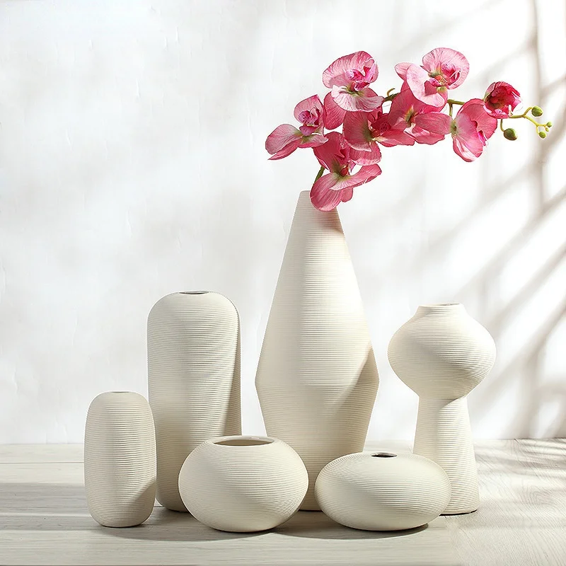 Creative ceramic ceramics white vase Ornaments modern minimalist living room home decoration accessories flower arrangement gift
Creative ceramic ceramics white vase Ornaments modern minimalist living room home decoration accessories flower arrangement gift