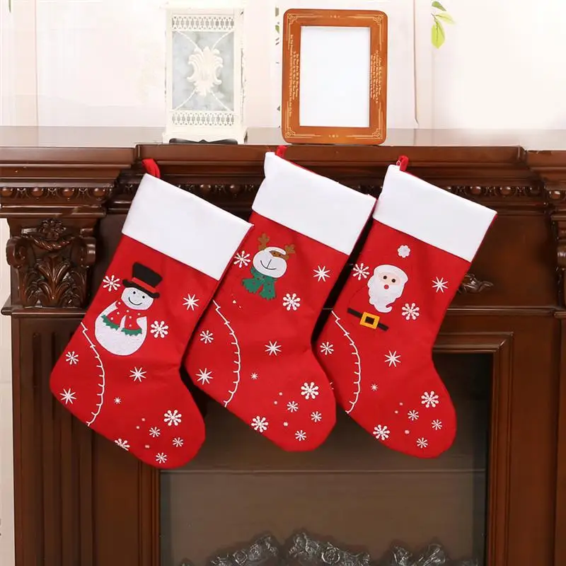 Christmas Stocking Santa Claus Hanging Sock Pendant New Year Non-woven Fabric Candy Gift Bag Christmas Ornaments 
Christmas Stocking Santa Claus Hanging Sock Pendant New Year Non-woven Fabric Candy Gift Bag Christmas Ornaments