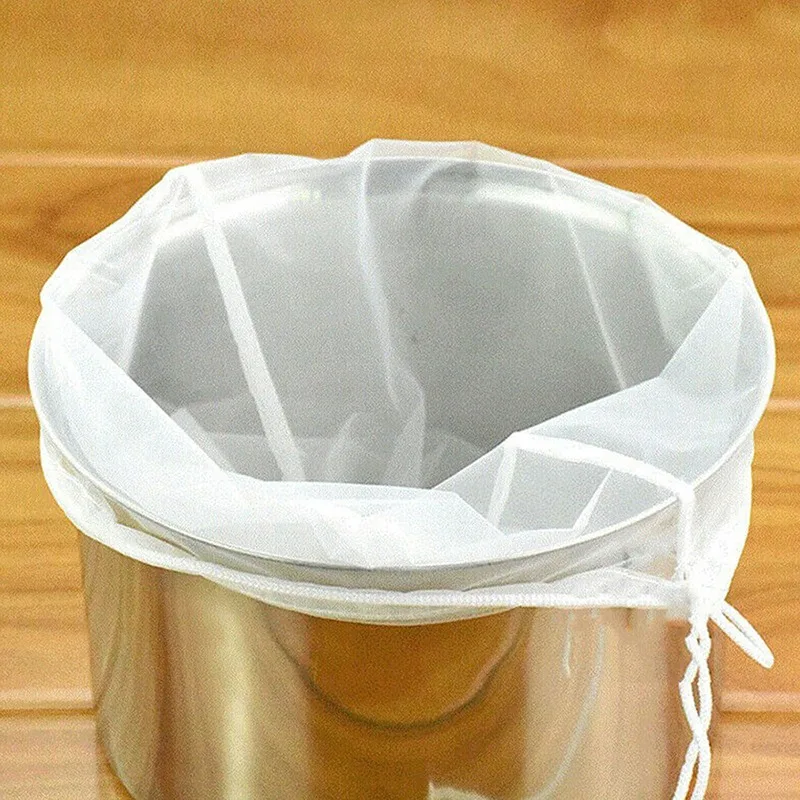 Reusable Beer Nylon Filter Bag for Homebrew Wine Coffee Milk and Juice Filters Herb Residue Kitchen Food Filter Accessories
Reusable Beer Nylon Filter Bag for Homebrew Wine Coffee Milk and Juice Filters Herb Residue Kitchen Food Filter Accessories