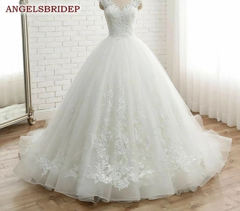 Angelsbridep Scoop Neck Tulle Ball Gown Wedding Dresses 2021 Appliques Beaded Chapel Train Bride Gown Vestido De Noiva Lace-up
Angelsbridep Scoop Neck Tulle Ball Gown Wedding Dresses 2021 Appliques Beaded Chapel Train Bride Gown Vestido De Noiva Lace-up