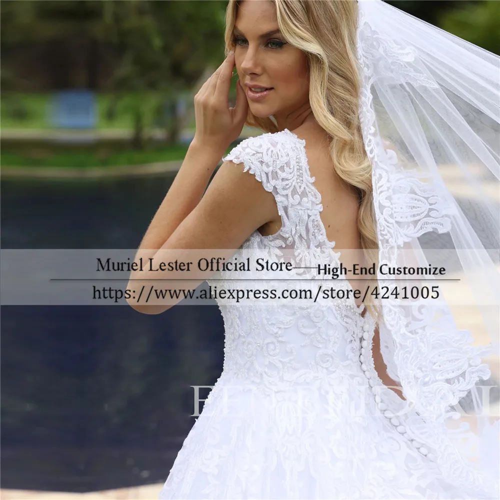 Autumn/Spring Suknia Slubna Cap Sleeves White Lace Appliques Bridal Gowns Open Back With Buttons Design Bohemian Wedding Dresses
Autumn/Spring Suknia Slubna Cap Sleeves White Lace Appliques Bridal Gowns Open Back With Buttons Design Bohemian Wedding Dresses