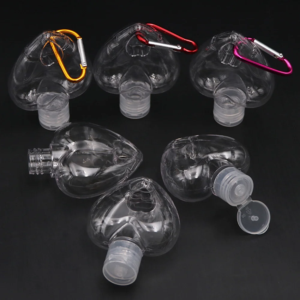 5/10 Pcs 50ml Portable Love Heart Shape Empty Refillable Bottles With Key Ring Travel Hand Sanitizer Bottle With Hook Carrier
5/10 Pcs 50ml Portable Love Heart Shape Empty Refillable Bottles With Key Ring Travel Hand Sanitizer Bottle With Hook Carrier