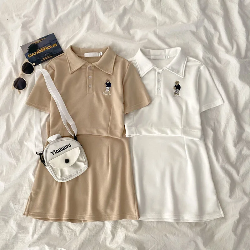 Sports Suit Short-Sleeved Hot Girl Ins Wind Short Belly Button Bear Polo Shirt Bag Hip Skirt Casual Summer Two-Piece Women Suit
Sports Suit Short-Sleeved Hot Girl Ins Wind Short Belly Button Bear Polo Shirt Bag Hip Skirt Casual Summer Two-Piece Women Suit