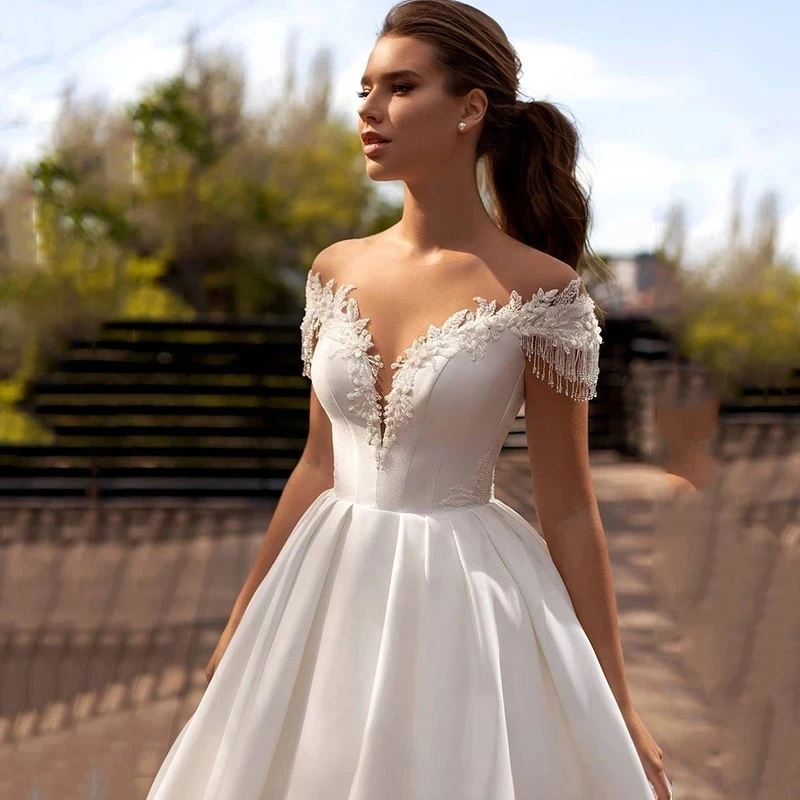 Backless Wedding Dresses A-line Off The Shoulder Appliques Beaded Boho Dubai Arabic Wedding Gown Bridal Dress Vestido De Noiva
Backless Wedding Dresses A-line Off The Shoulder Appliques Beaded Boho Dubai Arabic Wedding Gown Bridal Dress Vestido De Noiva