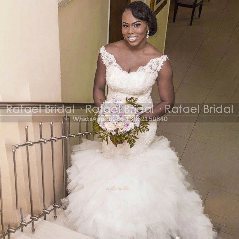 Sexy Plunging Neck Wedding Dress White Lace Appliques Beads Long Tiered Puffy Mermaid Sleeveless Women Dresses Bridal Gown
Sexy Plunging Neck Wedding Dress White Lace Appliques Beads Long Tiered Puffy Mermaid Sleeveless Women Dresses Bridal Gown