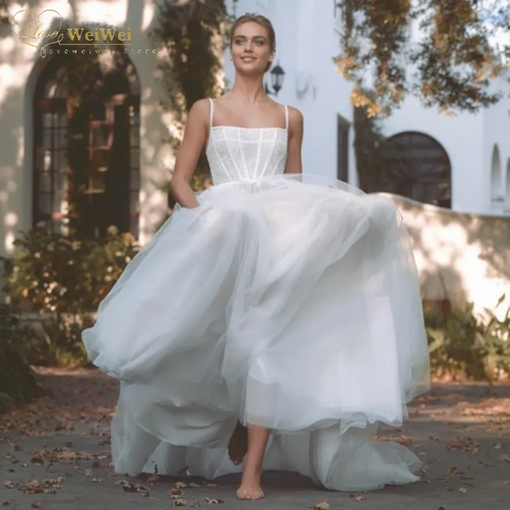 Beautiful Spaghetti Straps Wedding Dress Square Collar A-Line Court Train Sleeveless Back Button Appliques Vestidos De Novia
Beautiful Spaghetti Straps Wedding Dress Square Collar A-Line Court Train Sleeveless Back Button Appliques Vestidos De Novia