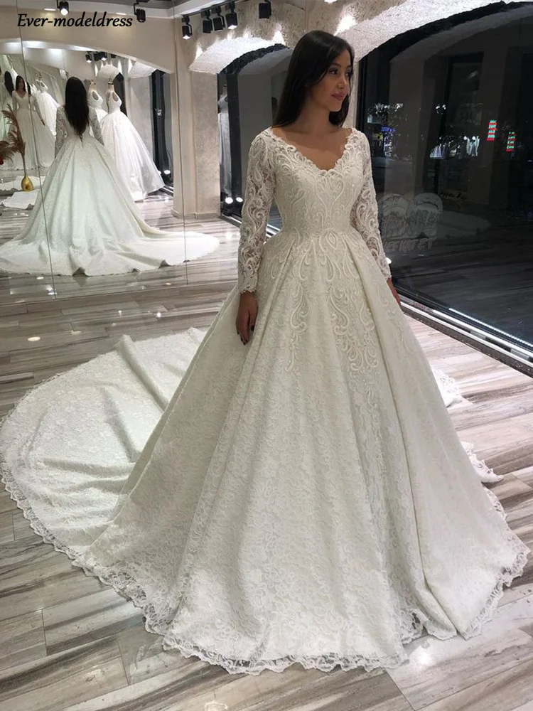 2021 New Princess Ball Gown Lace Wedding Dresses Long Sleeve V Neck Appliques Sweep Train Bridal Dress For Bride Robe De Mariee
2021 New Princess Ball Gown Lace Wedding Dresses Long Sleeve V Neck Appliques Sweep Train Bridal Dress For Bride Robe De Mariee