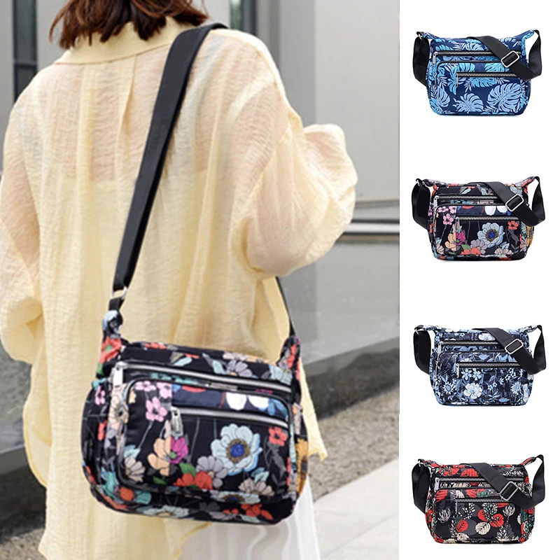 2021 Printed Multi-Pocket Large Capacity Waterproof Nylon Ladies Messenger Bag Zipper Design Shoulder Bag Elder Gift OPK1
2021 Printed Multi-Pocket Large Capacity Waterproof Nylon Ladies Messenger Bag Zipper Design Shoulder Bag Elder Gift OPK1