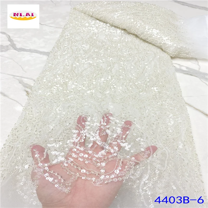 Nigerian White Lace Fabric 2021 High Quality Sequin Lace Trimmings Sewing African Beaded Lace Fabric For Woman Wedding NA4403B-2
Nigerian White Lace Fabric 2021 High Quality Sequin Lace Trimmings Sewing African Beaded Lace Fabric For Woman Wedding NA4403B-2