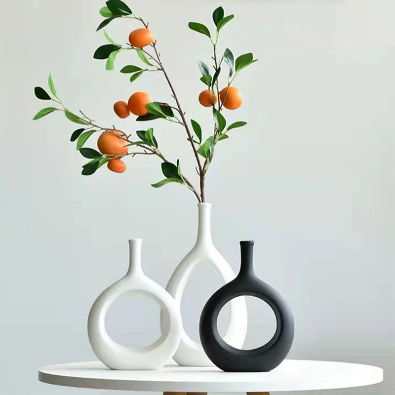 Ceramic Vase Round Hollow Doughnut Flowerpot Home Decoration Office Desktop Living Room Wine Cabinet Interior Decoration Gift
Ceramic Vase Round Hollow Doughnut Flowerpot Home Decoration Office Desktop Living Room Wine Cabinet Interior Decoration Gift