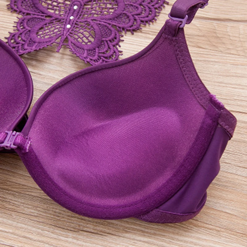 Underwear set for men and women, glossy lace bra with butterfly wings and buttons on the front 
Underwear set for men and women, glossy lace bra with butterfly wings and buttons on the front