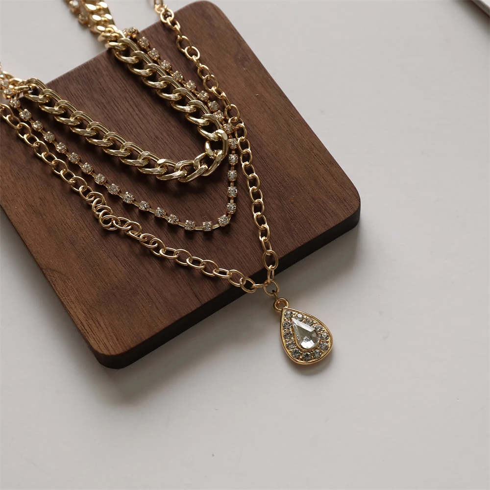 Fashion Water Drop Pendant Necklaces for Women Multilayer Crystal Statement Necklace Choker Clavicle Chain Party Jewelry New
Fashion Water Drop Pendant Necklaces for Women Multilayer Crystal Statement Necklace Choker Clavicle Chain Party Jewelry New
