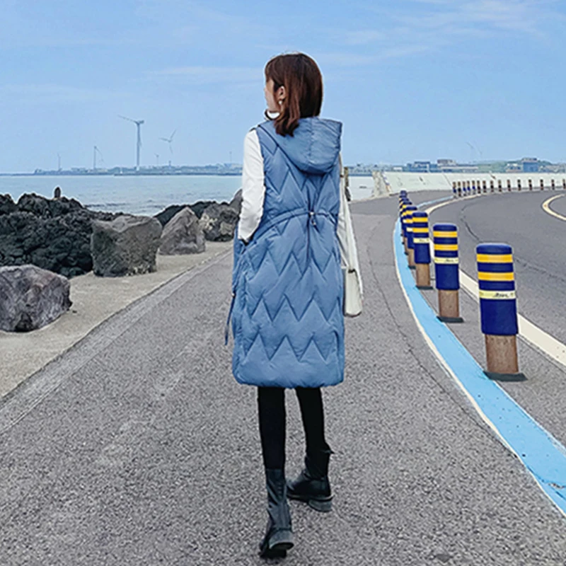 2020 Winter Solid Cotton Padded Long Vest Women Korean Style Thicken Hooded with Zipper Buttons Casual Warm Outwear Gilet Femme
2020 Winter Solid Cotton Padded Long Vest Women Korean Style Thicken Hooded with Zipper Buttons Casual Warm Outwear Gilet Femme