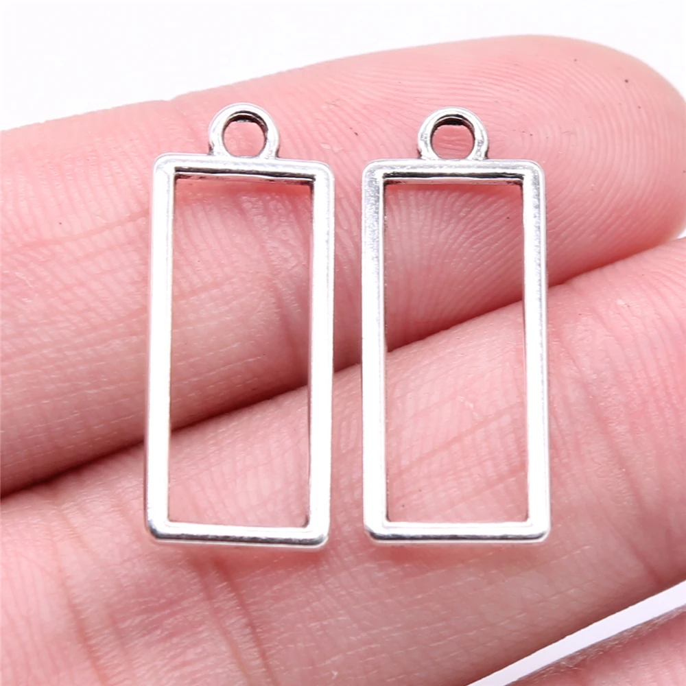 

WYSIWYG 40pcs 24x10mm Hollow Rectangular Geometry Charms Antique Silver Color For DIY Jewelry Making Zinc Alloy Charms