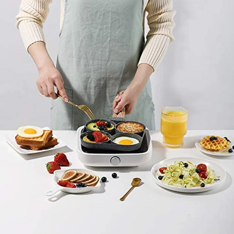 Four-hole omelette pan, non-stick aluminum alloy pan mold, general purpose mini pot for induction cooker 
Four-hole omelette pan, non-stick aluminum alloy pan mold, general purpose mini pot for induction cooker