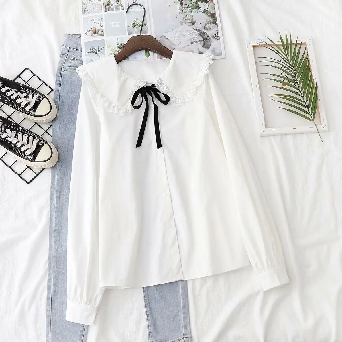 Spring white loose doll collar long-sleeved shirt female pure cotton lace ruffled ribbon shirt female student top
Spring white loose doll collar long-sleeved shirt female pure cotton lace ruffled ribbon shirt female student top