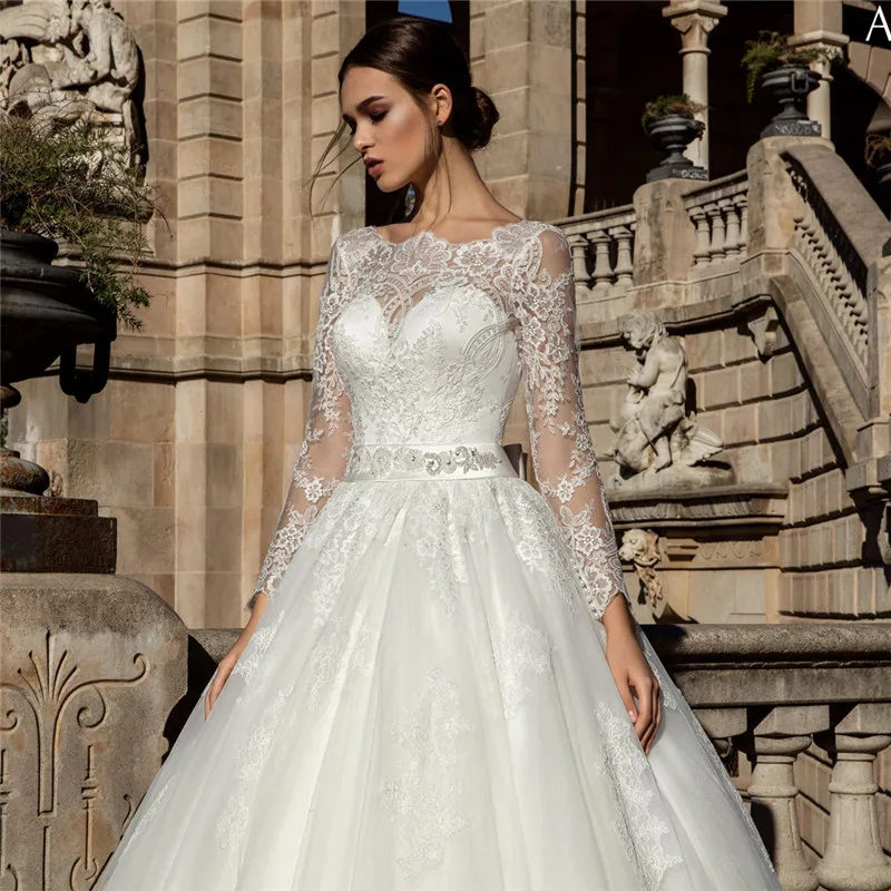 Long Sleeves A-Line Wedding Dresses Lace Appliques Princess V-Shape Back Bridal Gowns Sexy Backless Garden Vestidos De Mariee 
Long Sleeves A-Line Wedding Dresses Lace Appliques Princess V-Shape Back Bridal Gowns Sexy Backless Garden Vestidos De Mariee