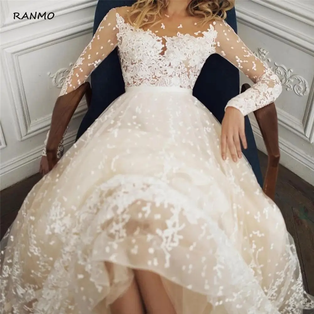 RANMO Scoop Scatted Lace Long Sleeves Champagne Wedding Dress Open Back Tulle Applique Fashion Bridal Dress vestidos noiva
RANMO Scoop Scatted Lace Long Sleeves Champagne Wedding Dress Open Back Tulle Applique Fashion Bridal Dress vestidos noiva